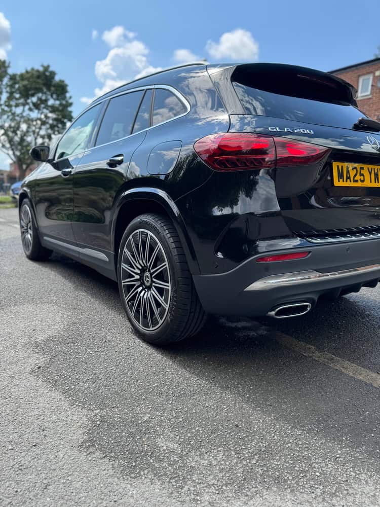 Black SUV with a freshly refinished exterior